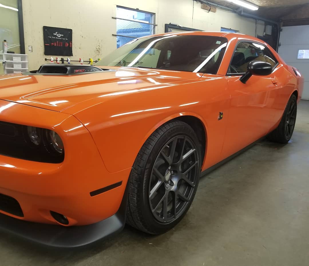 Orange Vinyl Wrapped Dodge Charger by Royal Customs Stratford, Ontario